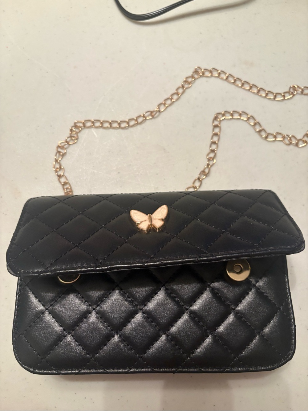 Source Unknown Black Quilted Crossbody with Gold Butterfly Accent